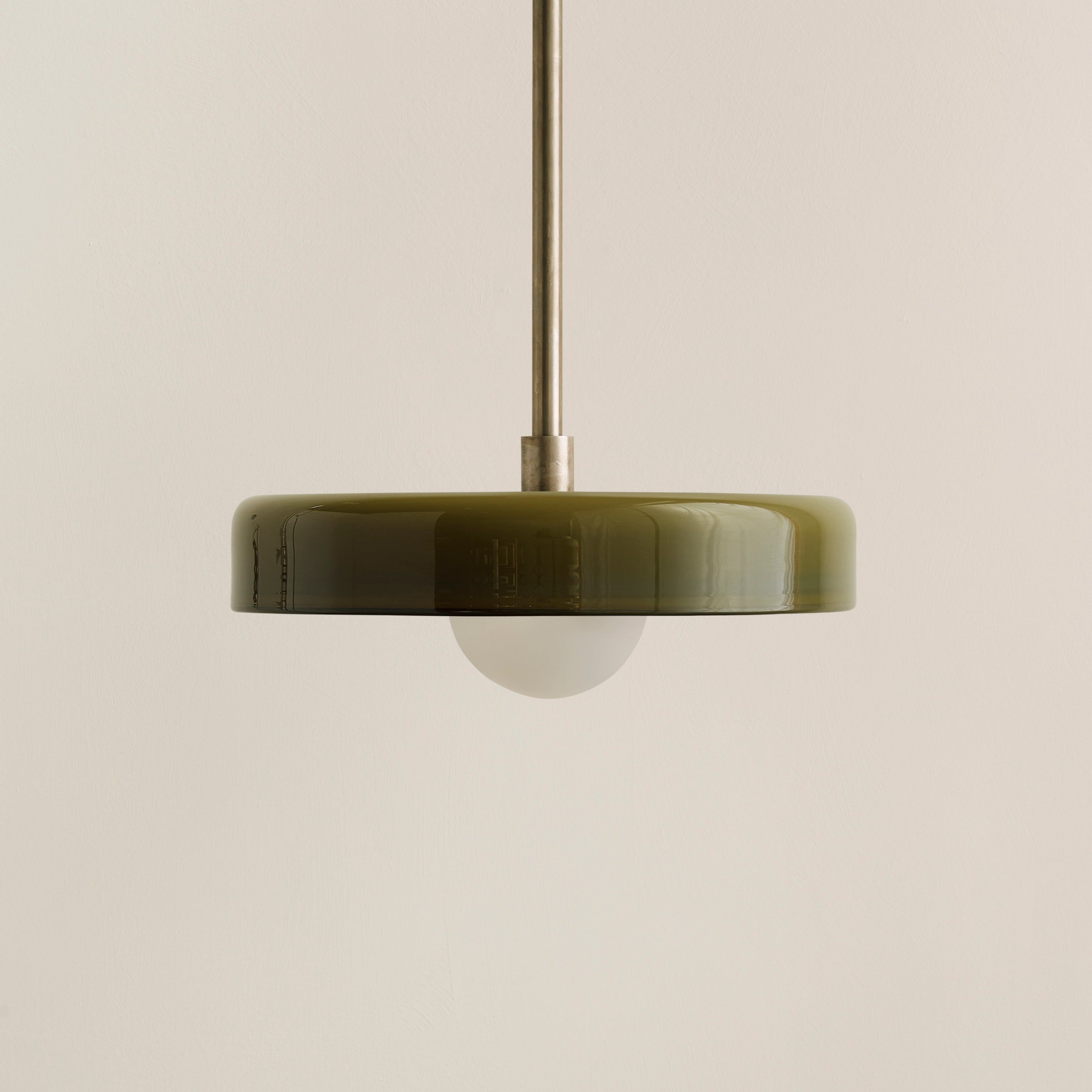 Glass disc pendant deals light