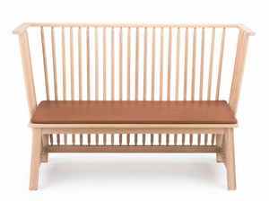 A light natural wood bench with a slatted back and sides and a brown cushioned seat, shown against a plain white background.