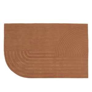 Brown textured rug on a white background