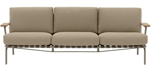 A three-seat outdoor sofa with textured beige cushions and light brown wooden armrests, supported by a metal frame with a slatted base, shown against a plain white background.