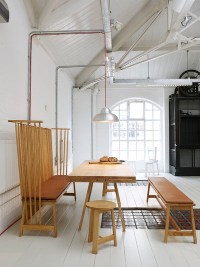 Modern interior with wooden furniture and white walls